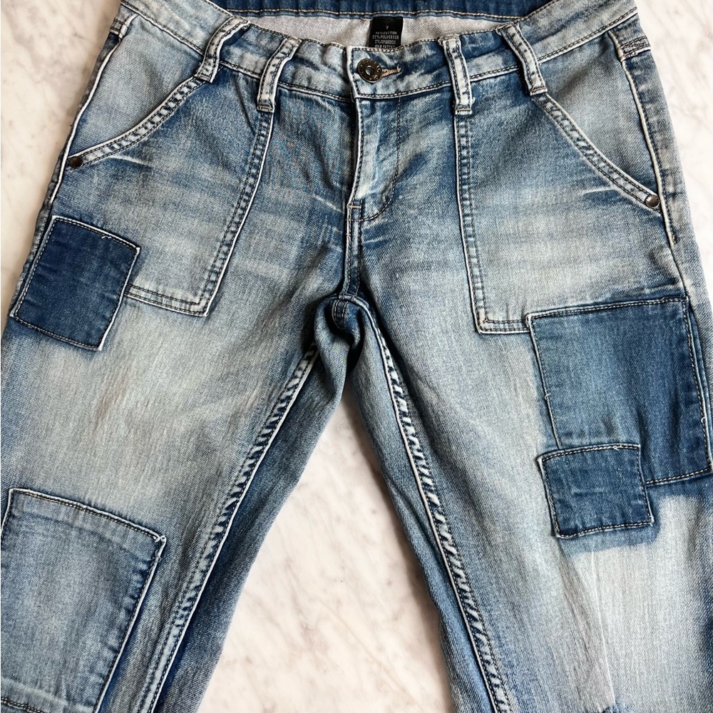 Flare bottom stretchy patch jeans